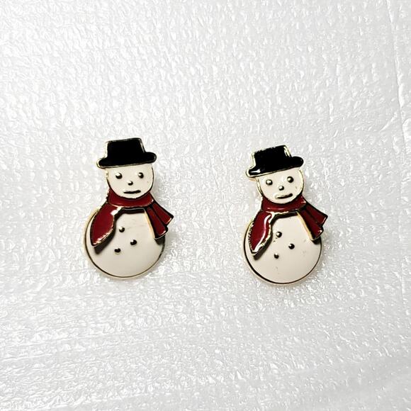 Avon Jewelry - VINTAGE spinning snowman enamel pierced earrings from Avon